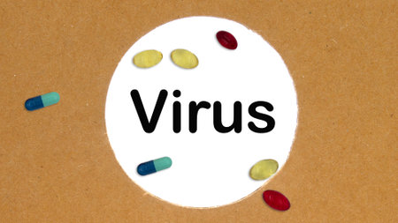 The word VIRUS is written inside a cardboard with a round hole.の写真素材