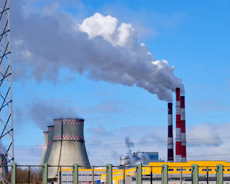 A smokestack with a lot of harmful smoke. Ecology. Environmental protection.