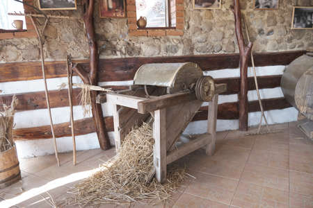 an old device to separate the grains of the ears.の写真素材