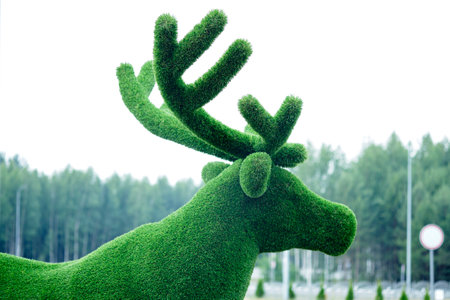 The deer's head is made of green grass, close-up.の写真素材