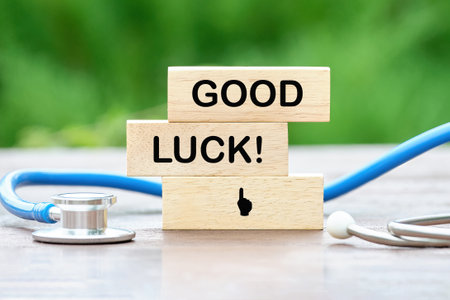 Good luck text on wooden blocks on a green backgroundの写真素材
