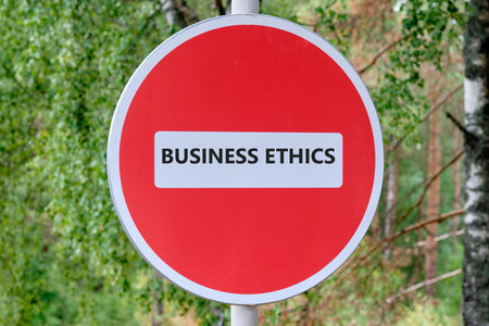 BUSINESS ETHICS The inscription, the text on the sign movement is prohibited against the background of the forestの写真素材