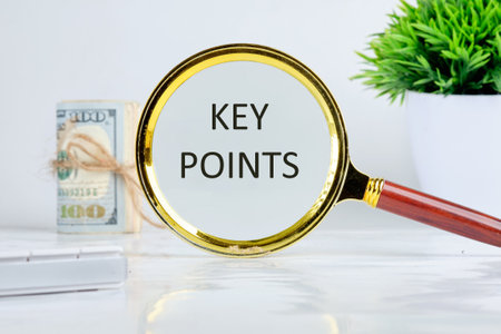KEY POINTStext, word, description found through a magnifying glass on a light backgroundの写真素材