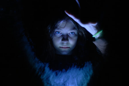 A girl with a very sad face is looking for a way out of a difficult situation she got intoの写真素材