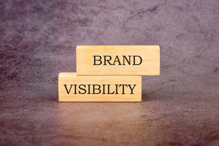 Words Brand visibility on wooden blocks. The concept of a business ideaの写真素材
