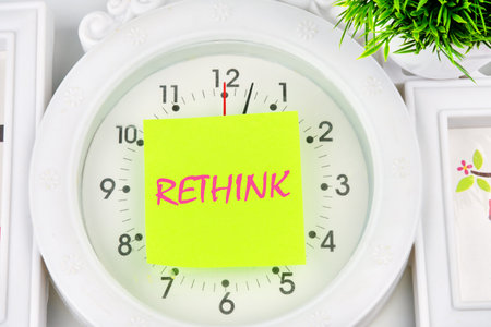 Rethink is shown using a text the description on the sticker glued to the watch