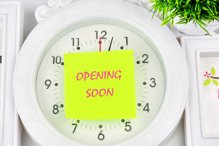 Opening soon the inscription on the sticker glued to the watchの写真素材