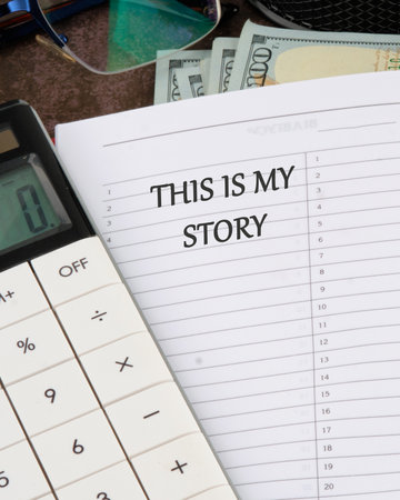 Life and business motivational inspirational concept. Text THIS IS MY STORY in the business book...