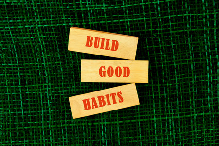 build good habits inspirational writing a conceptual phrase on wooden blocks top view