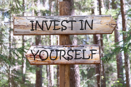 Business and Invest in yourself concept. Copy space. Concept words Invest in yourself on a piece of...