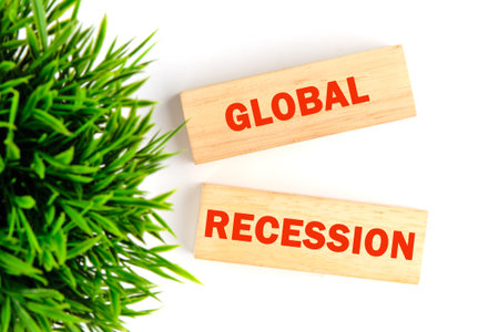 Business and global recession concept. Copy space. Global recession symbol on wooden blocks on a...