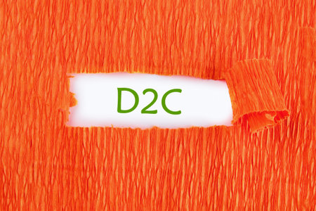 Direct to Consumer D2C.Business concepts. D2C on white under the paper