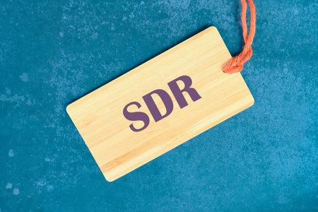 Business and SDR concept. Copy space. Special Drawing Rights. Word SDR. on a card with a string
