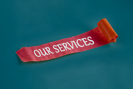 Business concept. OUR SERVICES on a piece of an unfolded note