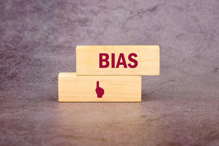 Concept of facts and biases. A word BIAS written, It is made up of vertical blocks on an abstract...