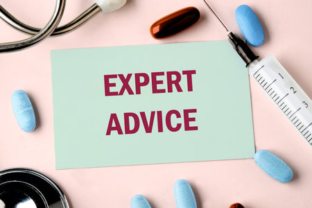 Business person presentation of expert advice concept. EXPERT ADVICE words written on the business card, top view. Lifestyle conceptの写真素材