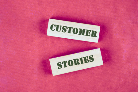 Business concept. Customer Stories words made up of wooden blocksの写真素材