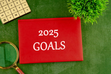 New Year New Start, Resolutions, Strategy, mission concept. 2025 GOALS on the red book, business on...