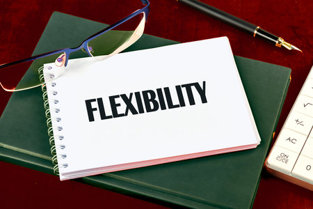 Business flexibility concept. Copy space. Flexibility symbol. Concept word Flexibility top view in notepadの写真素材