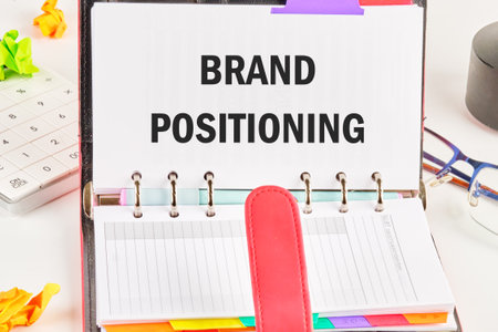 Economic concept. The inscription BRAND POSITIONING in a business notebook on a free page from entriesの写真素材