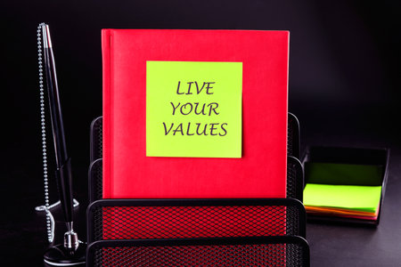 Business, psychological and live your values concept. Copy space. LIVE YOUR VALUES words written on...
