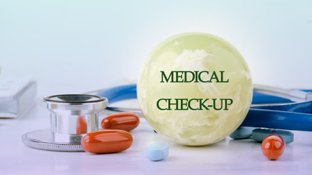 MEDICAL CHECK-UP words written on the ball, front viewの写真素材