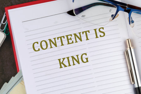 Business and Content is king concept. Copy space. CONTENT IS KING there is a memo for analysis in the business notebookの写真素材