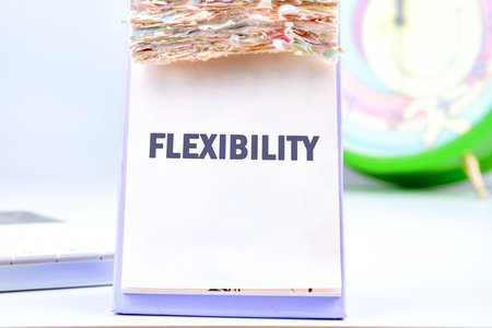 Business flexibility concept. Copy space. Flexibility symbol. Concept word Flexibility in a desktop calendar on a light backgroundの写真素材