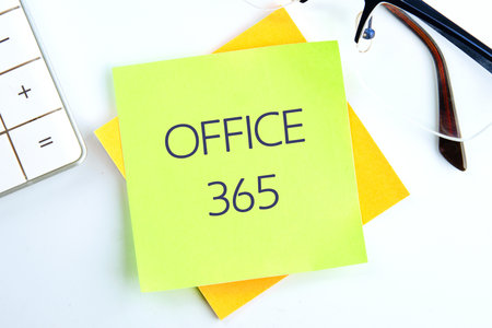 OFFICE 365 words written on a light green sticker on a light backgroundの写真素材