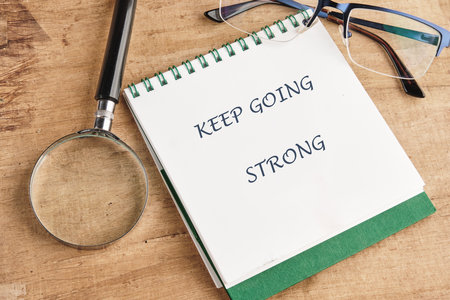Business, motivation and keep moving forward concept. Copy space. Concept words KEEP GOING STRONG.の写真素材