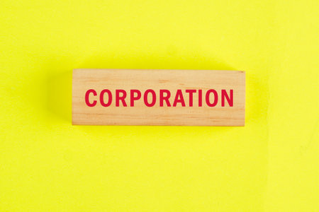 The concept word CORPORATION. Personal Income Tax, Corporate Tax, Financial Research, Documents, Reports and Calculations Concept.の写真素材