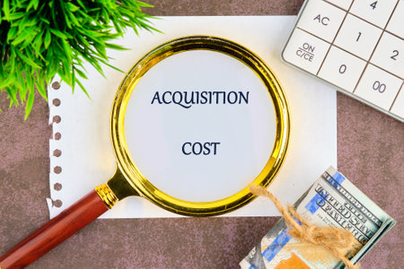 A conceptual phrase on the topic of ACQUISITION COST business. Business concept.の写真素材