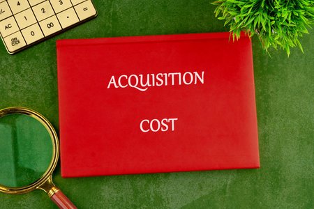 A conceptual phrase on the topic of ACQUISITION COST business. Business concept.の写真素材
