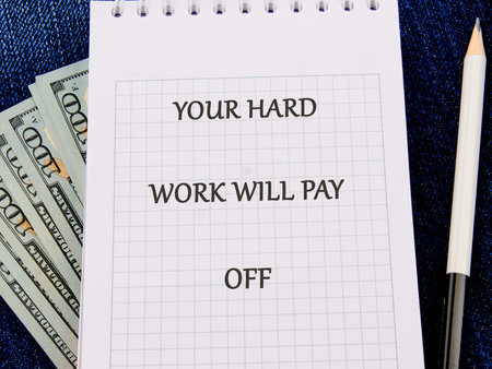 Concept of building success foundation. Text YOUR HARD WORK WILL PAY OFF.の写真素材
