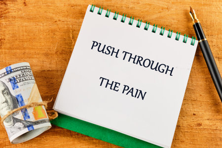Despite discomfort concept. Words PUSH THROUGH THE PAIN.