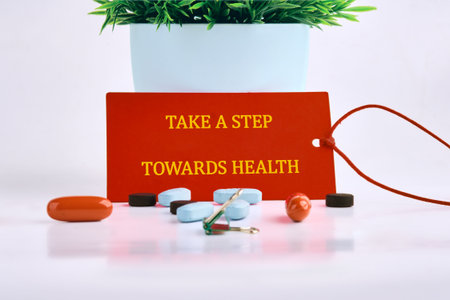 The concept phrase is TAKE A STEP TOWARDS HEALTH. Family values concept. lose up, copy space, background.の写真素材