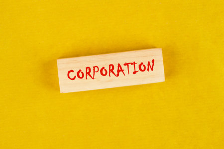 The concept word CORPORATION. Personal Income Tax, Corporate Tax, Financial Research, Documents, Reports and Calculations Concept.の写真素材