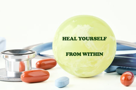 The concept phrase HEAL YOURSELF FROM WITHIN. Heal yourself, mental health, absent-minded, feeling concept.の写真素材