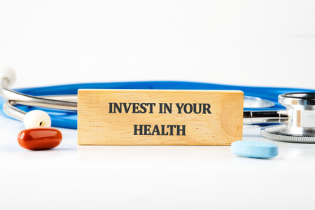 THE CONCEPT PHRASE INVEST IN YOUR HEALTH. Concept health, sport, diet and fitness.の写真素材