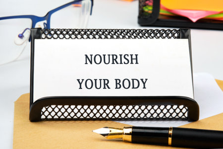 The concept phrase NOURISH YOUR BODY. The concept of beauty and health.の写真素材