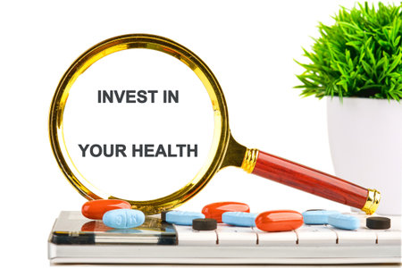 THE CONCEPT PHRASE INVEST IN YOUR HEALTH. Concept health, sport, diet and fitness.の写真素材