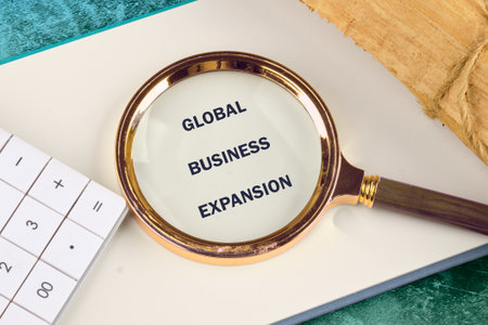 GLOBAL BUSINESS EXPANSION Concept Text. Global digital interface technology and networking concept.の写真素材