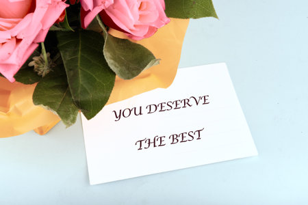 The concept phrase is YOU DESERVE THE BEST. The concept of good mood. Self care and happiness concept.の写真素材