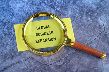 GLOBAL BUSINESS EXPANSION Concept Text. Global digital interface technology and networking concept.の写真素材