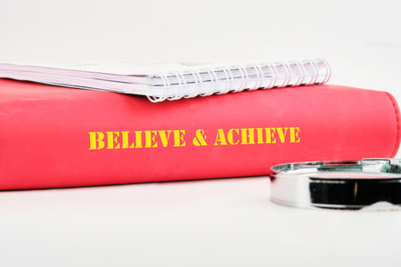 Inspiration quotes concept. BELIEVE and ACHIEVE words.の写真素材