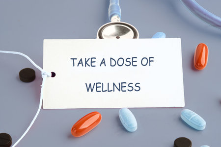 The concept phrase is TAKE A DOSE OF WELLNESS. Health concept. Pharmacological preparations, medicinal products.