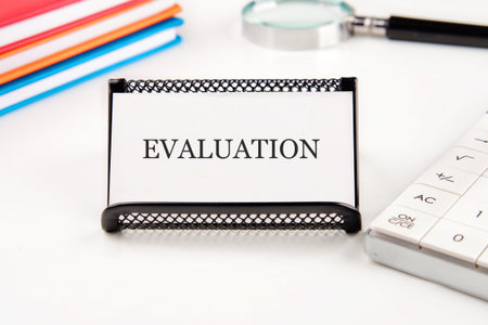 EVALUATION word. Learning, improvement, planning and development business concept.