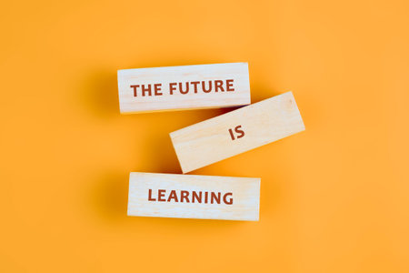 Business, modern technology, internet and networking concept. Copy space assembled from blocks on orange background, top view.の写真素材