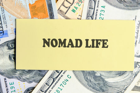 A vibrant scene showcases the essence of nomad life, surrounded by various currency notes, reflecting the financial freedom and exploration enjoyed by travelers.の写真素材