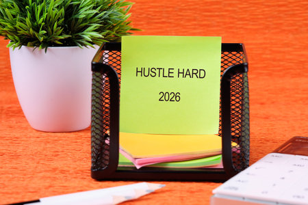 A workspace scene shows a black mesh organizer holding colorful sticky notes. A bright green note...
